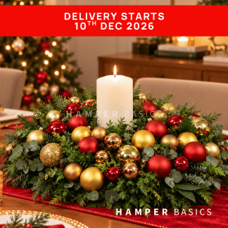 Christmas table centrepiece with Christmas ornaments and festive foliages