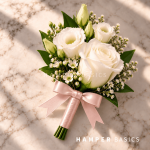 Groom boutonniere with white rose and lisianthus
