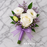 Groom boutonniere with white rose and white lisianthus