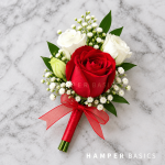 Groom boutonniere with red rose and white lisianthus