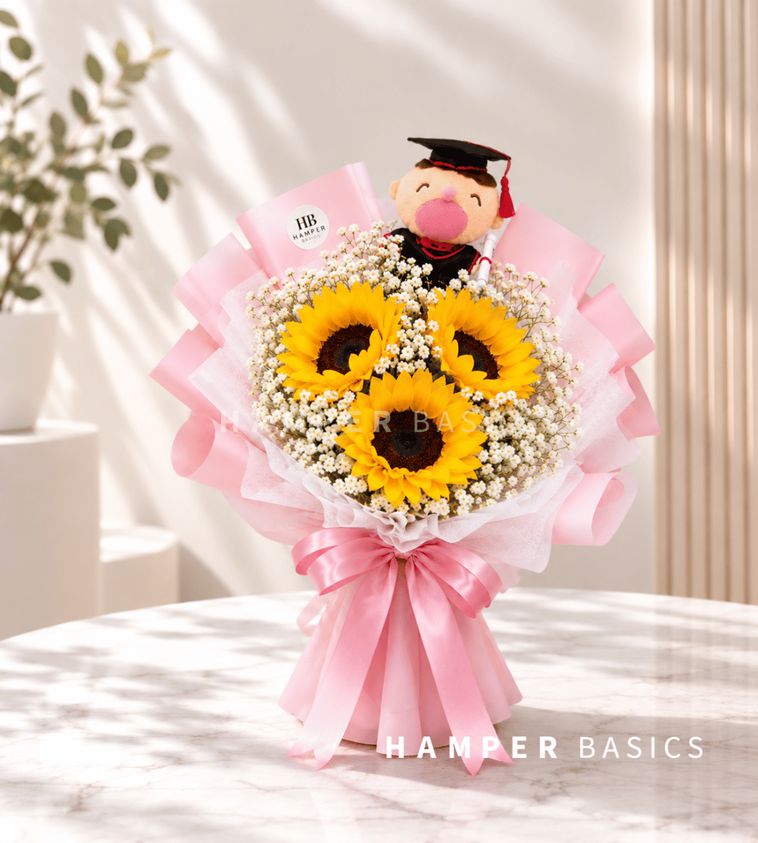 Graduation flower bouquet with sunflowers, baby's breath and graduation bear plushie