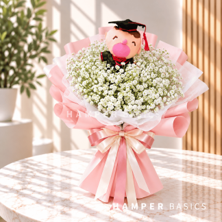 Graduation flower bouquet with white baby's breath, bear plushie in prink wrapping